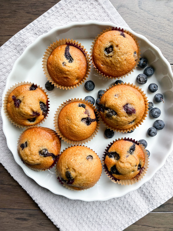 Blueberry and chocolate chip muffins on a serving dish